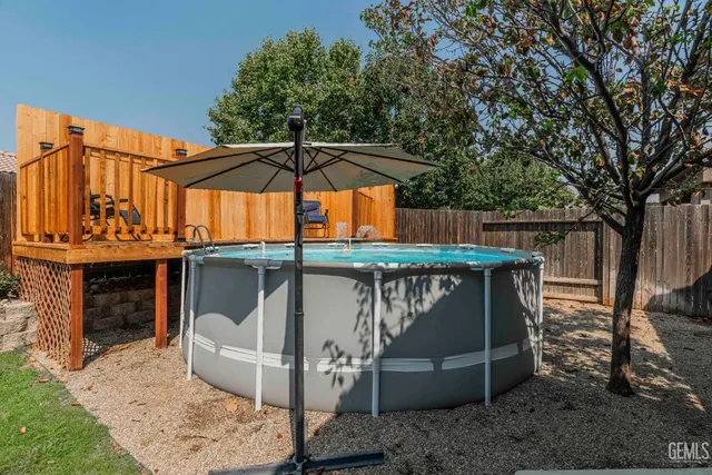 a view of outdoor space with shower and trees
