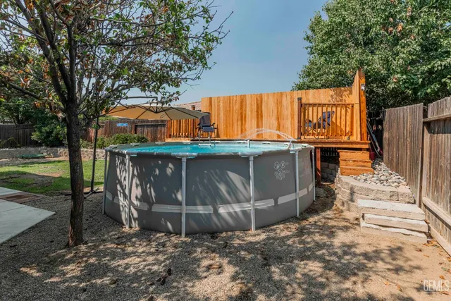 a view of a backyard with a small cabin