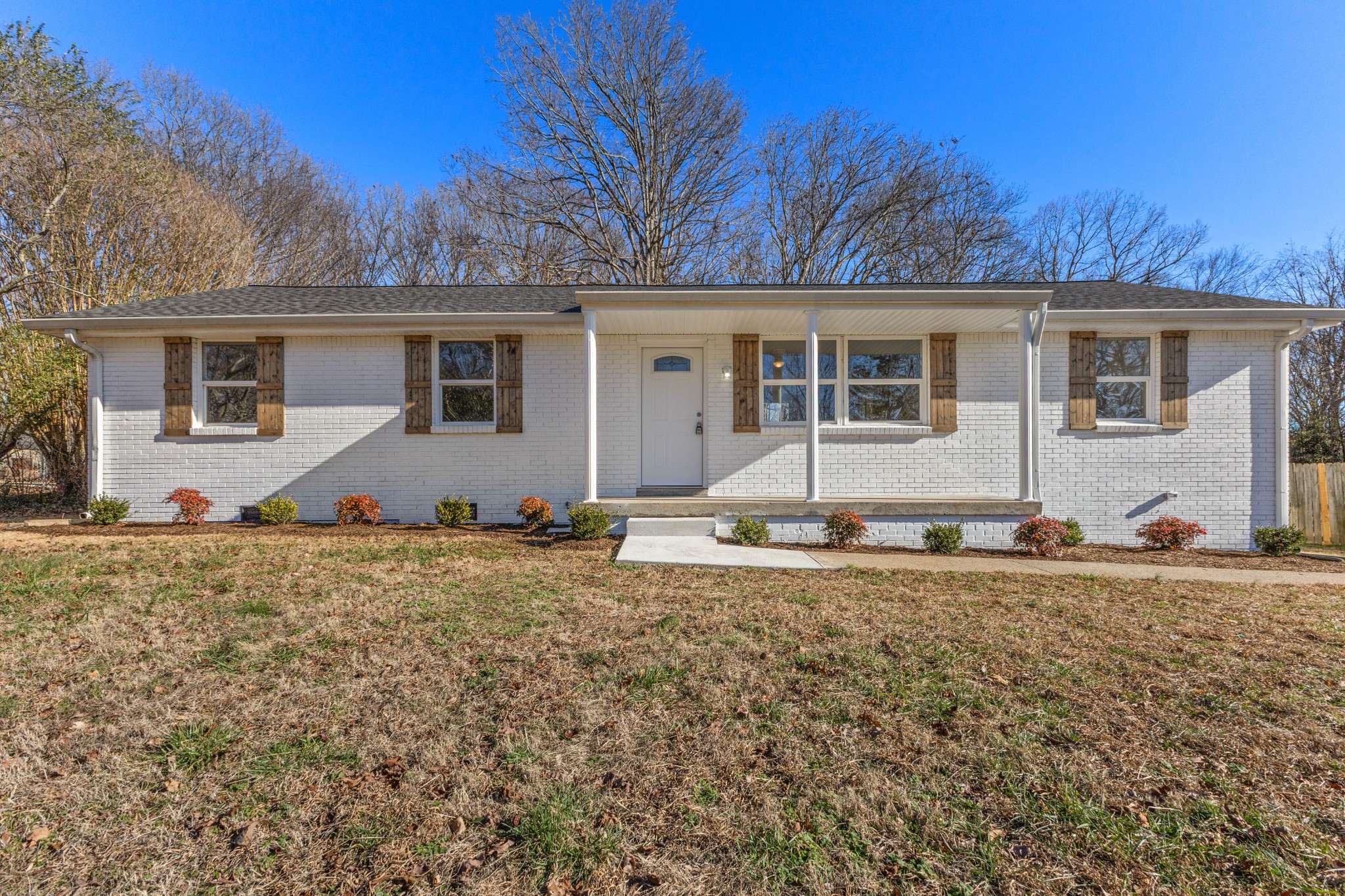 1029 Granada Road Ashland City, TN 37015 - Photo 14 of 34 front view of a house with a yard