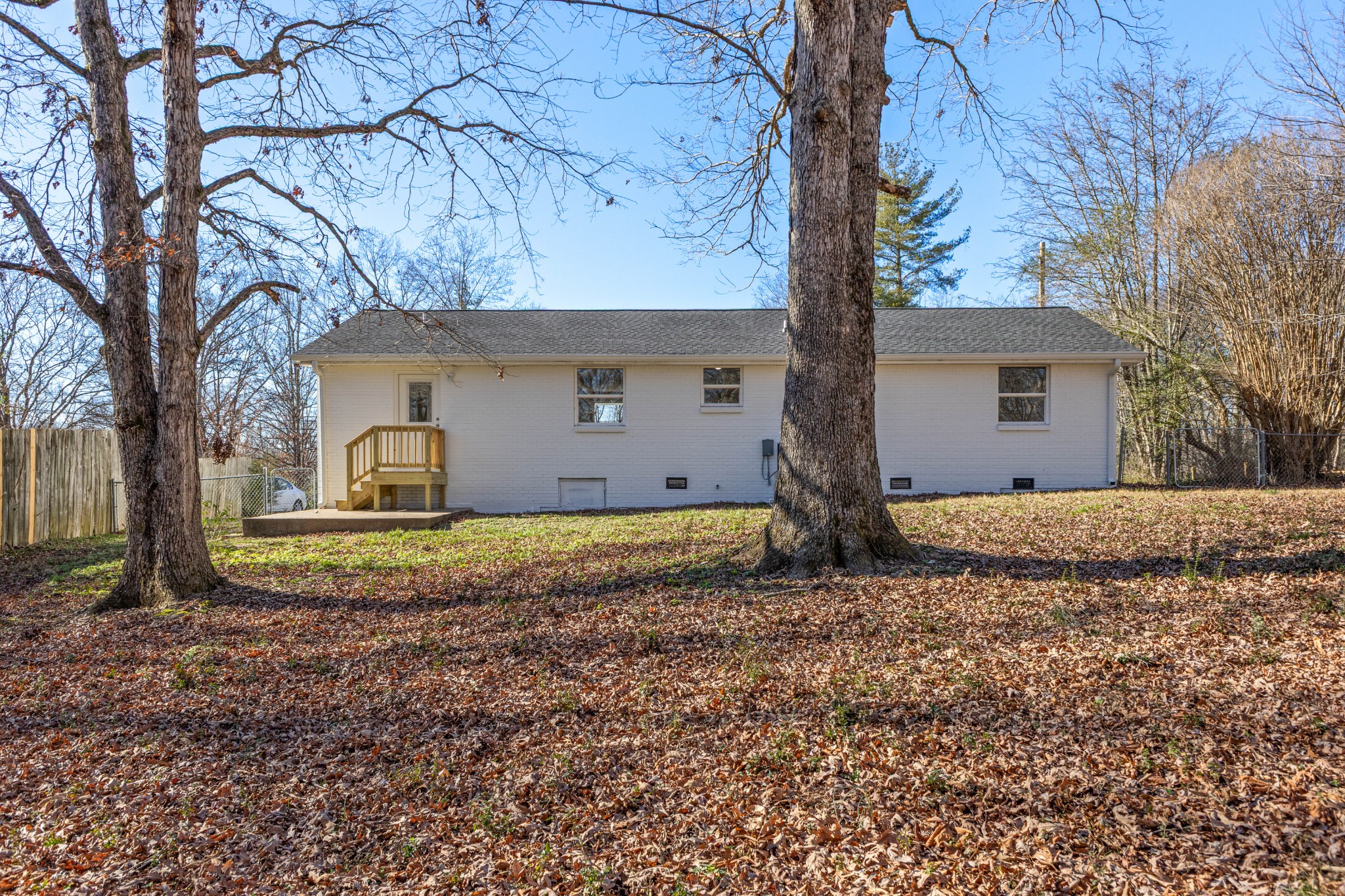 1029 Granada Road Ashland City, TN 37015 - Photo 17 of 34 a view of a house with large trees