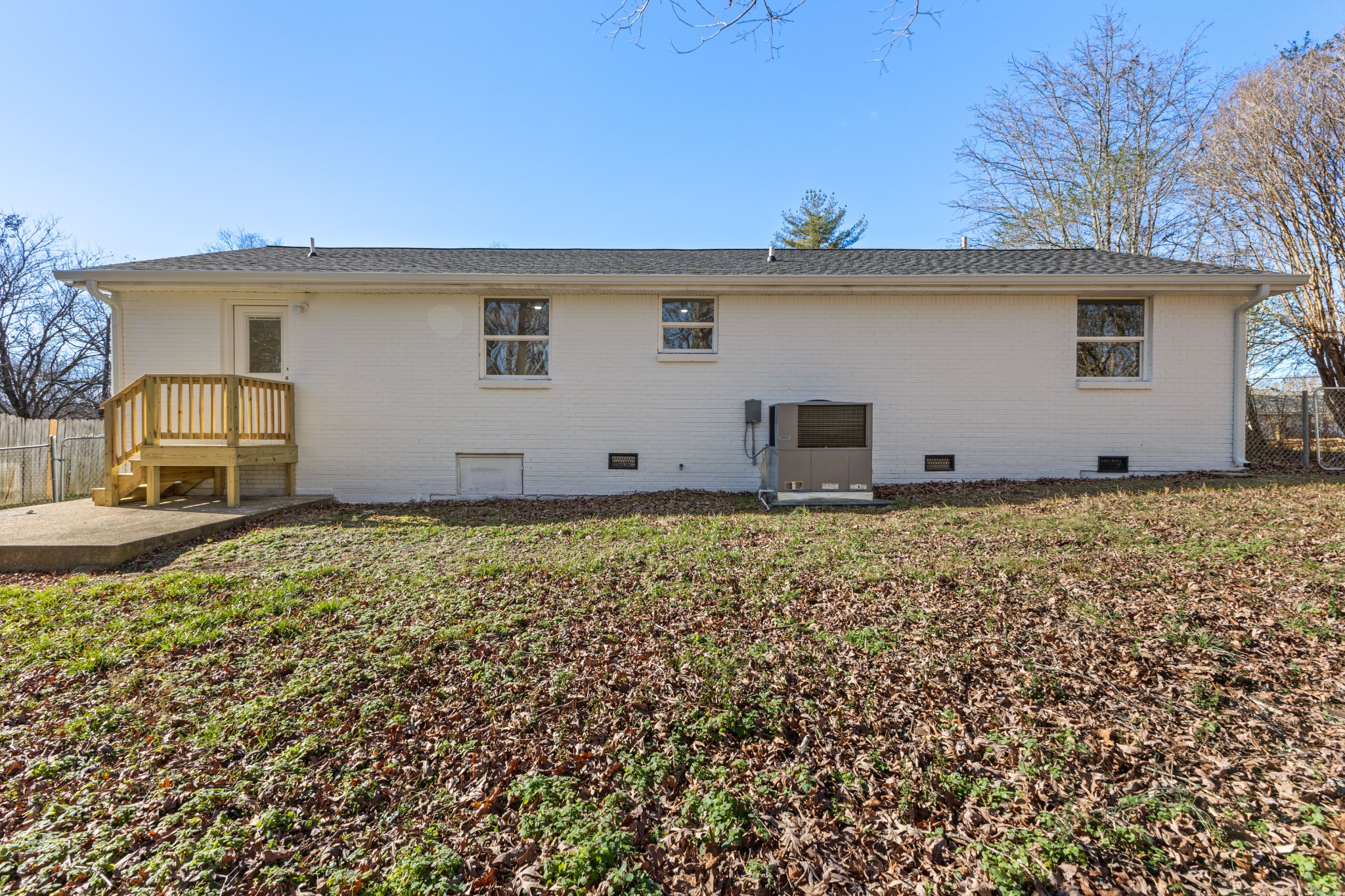 1029 Granada Road Ashland City, TN 37015 - Photo 18 of 34 front view of a house with a wooden fence