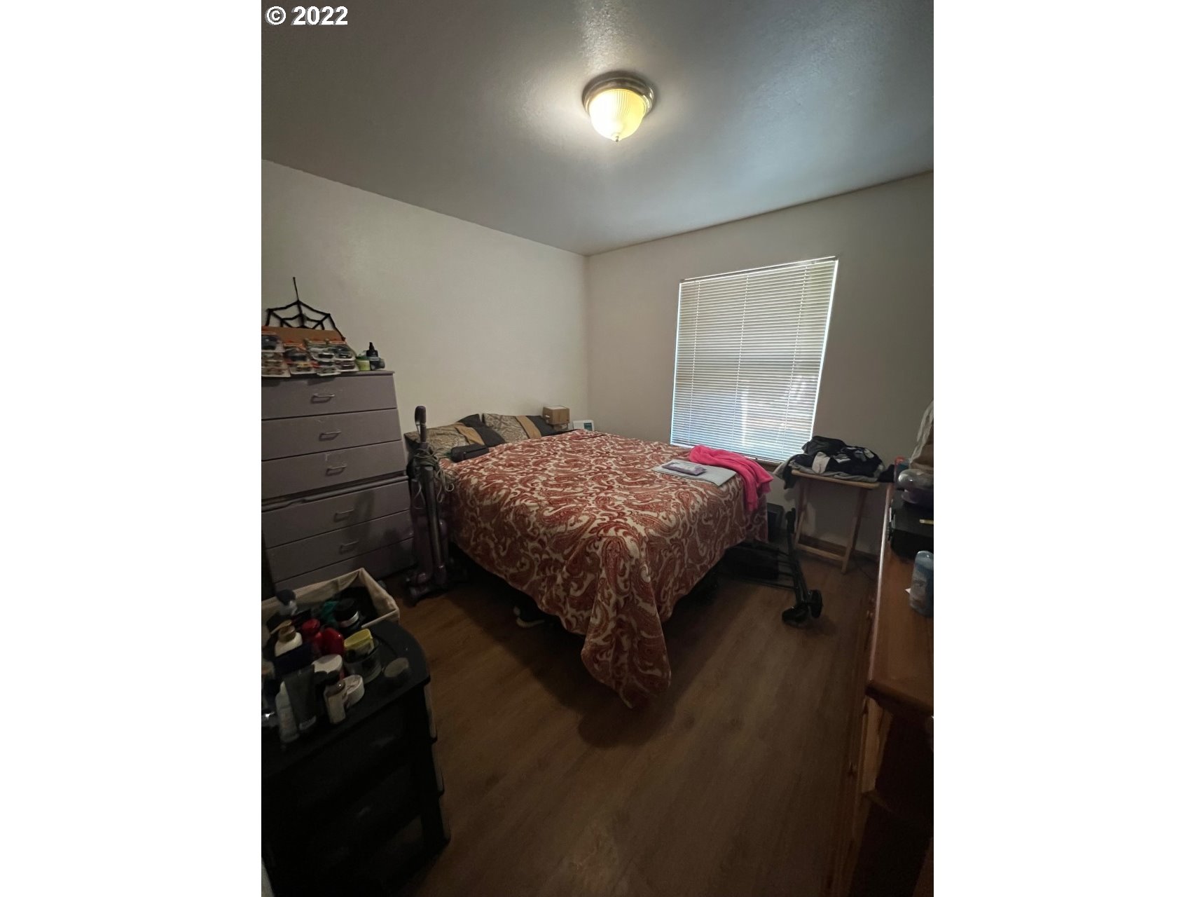3380 Virginia Avenue Springfield, OR 97478 - Photo 6 of 11 a bed sitting in a bedroom next to a window
