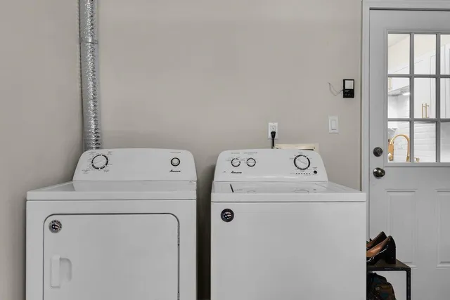 a view of a chairs with wooden fence