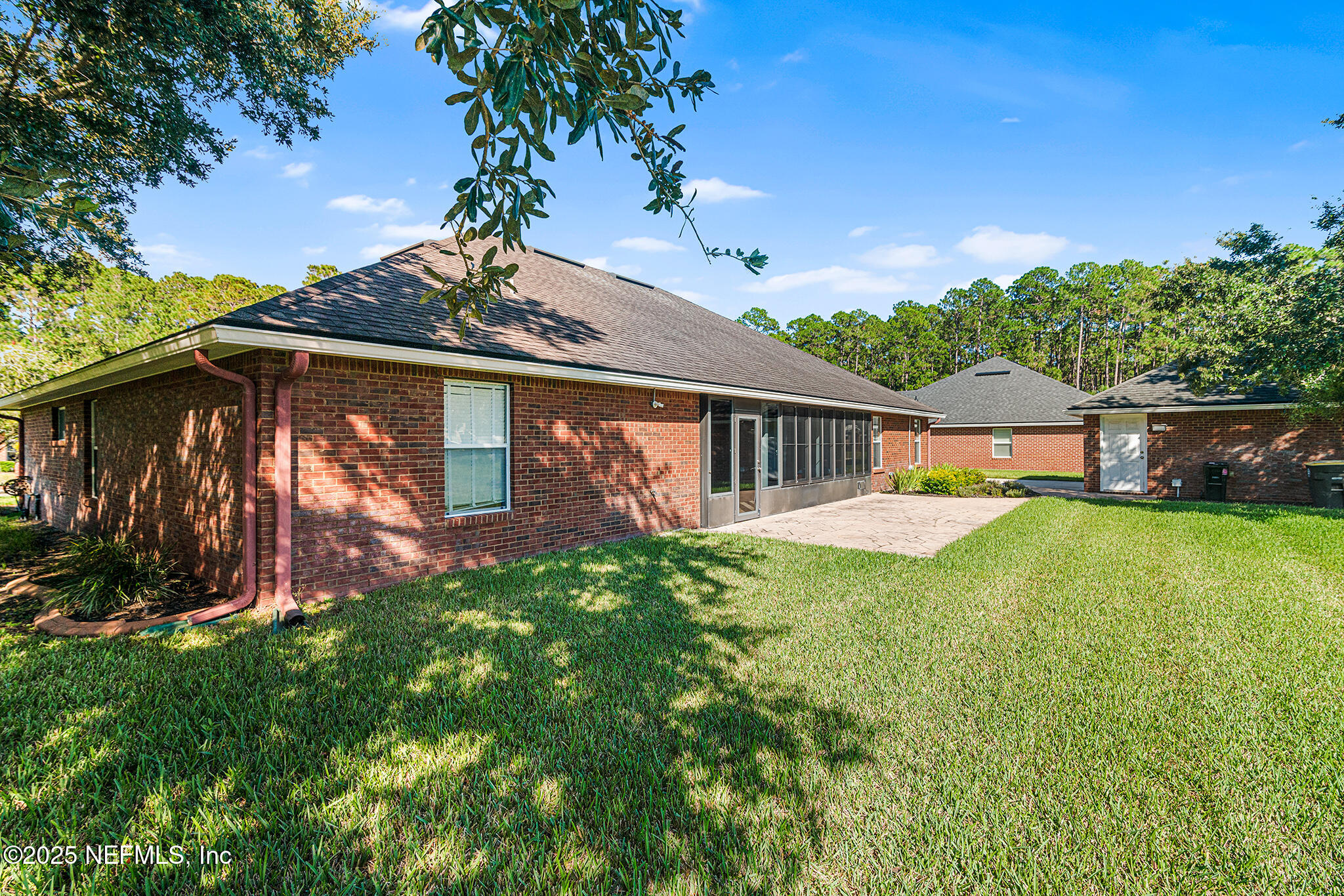 10922 Dunnotar Road Jacksonville, FL 32221 - Photo 28 of 35 a view of a house with backyard and sitting area