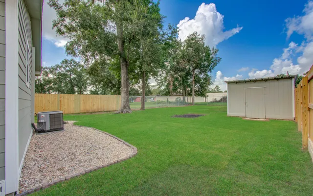 a view of a backyard with a garden
