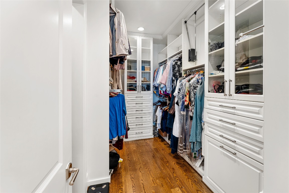 2109 Bancroft Lane Houston, TX 77027 - Photo 32 of 40 a view of walk in closet with clothes and shoes