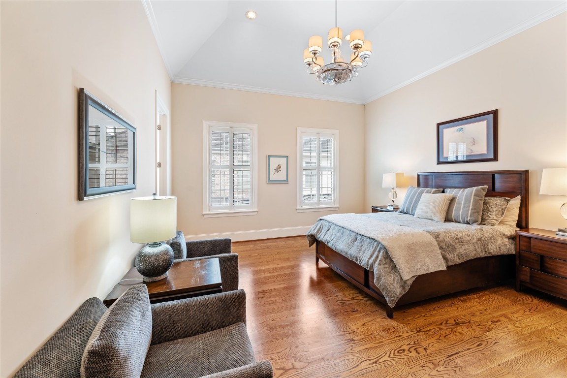 2109 Bancroft Lane Houston, TX 77027 - Photo 35 of 40 a spacious bedroom with a bed and a couch