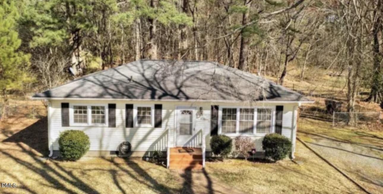 810 Milton Road Durham, NC 27712 - Photo 1 of 21 a view of a house with backyard sitting area