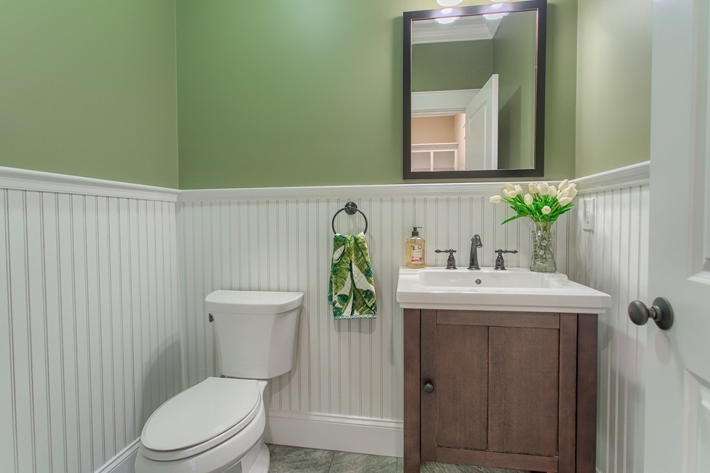 184 Gates Pond Road Berlin, MA 01503 - Photo 12 of 30 a bathroom with a toilet sink and mirror