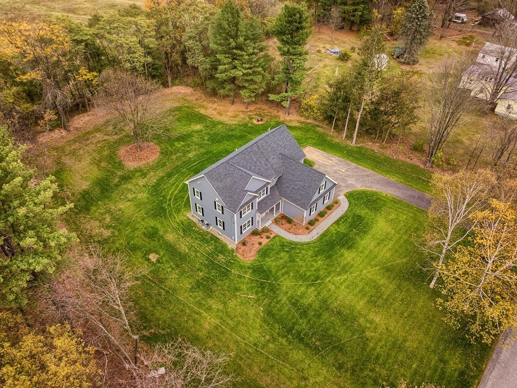 184 Gates Pond Road Berlin, MA 01503 - Photo 3 of 30 a view of a house with a yard