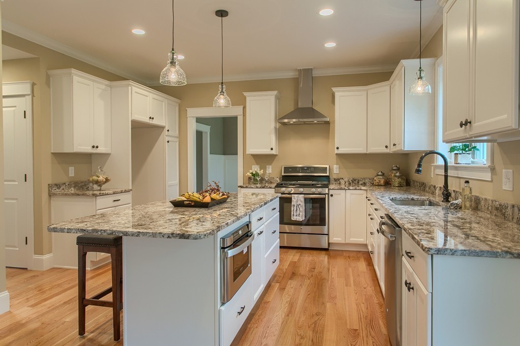 184 Gates Pond Road Berlin, MA 01503 - Photo 5 of 30 a kitchen with stainless steel appliances granite countertop a sink a stove and a refrigerator