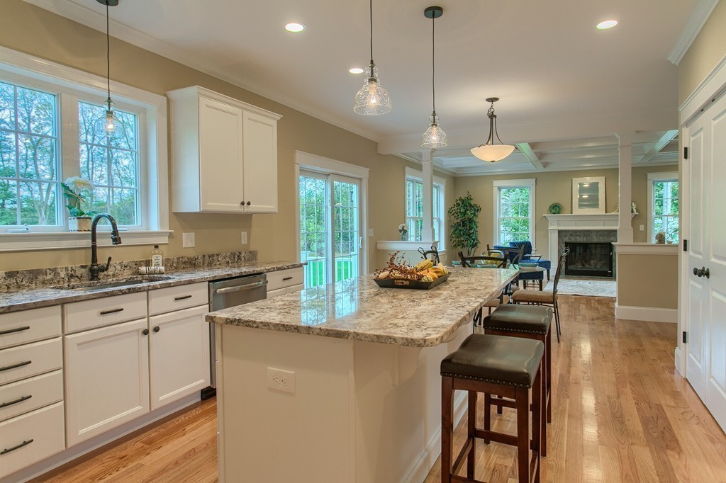 184 Gates Pond Road Berlin, MA 01503 - Photo 7 of 30 a kitchen with sink stove and cabinets