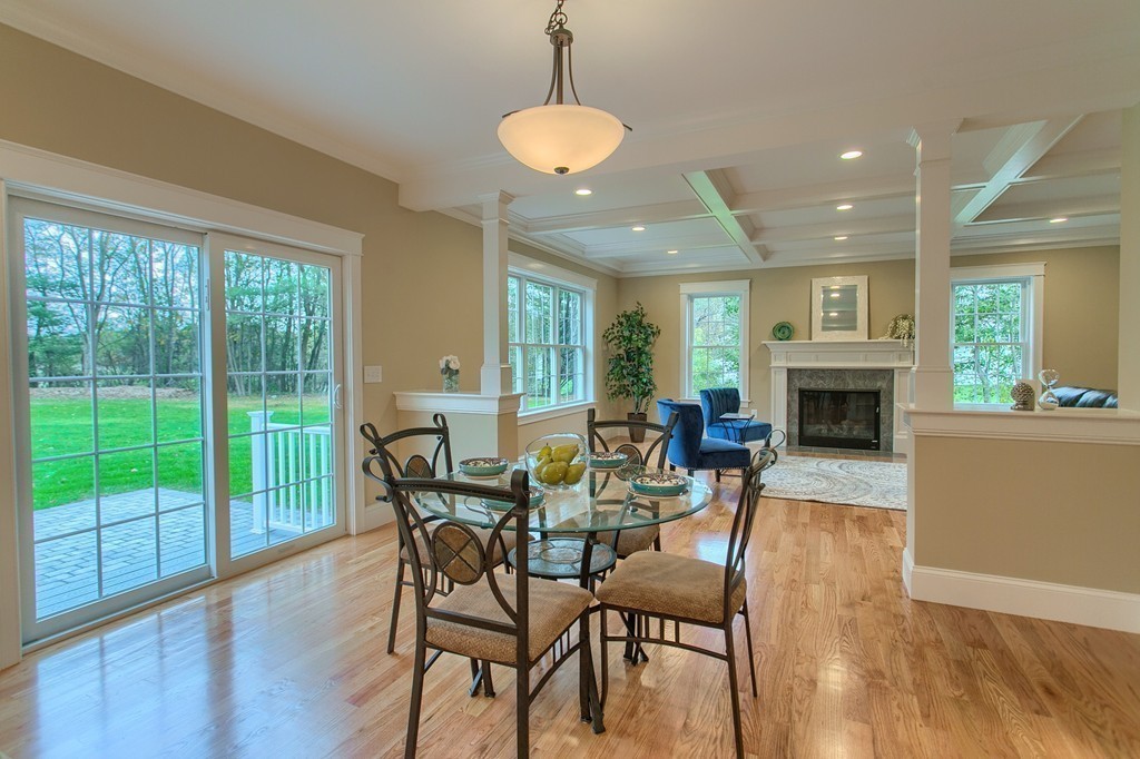 184 Gates Pond Road Berlin, MA 01503 - Photo 8 of 30 a view of a dining room with furniture window and wooden floor