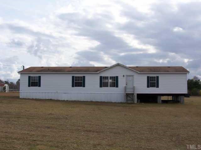 3821 Wrench Road Godwin, NC 28344 - Photo 1 of 1 a house view with a garden space