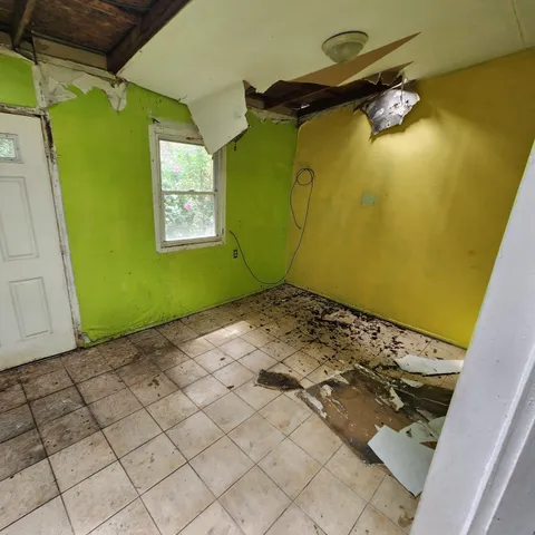a view of a bathroom with a shower and a tub
