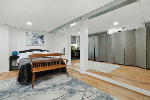 a bedroom with a bed and a walk in closet
