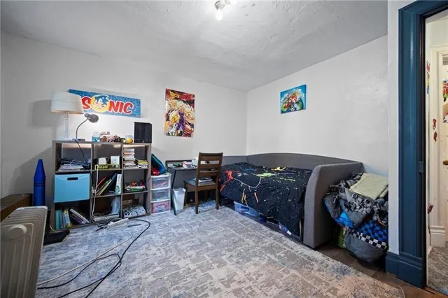 a bedroom with furniture and a bed