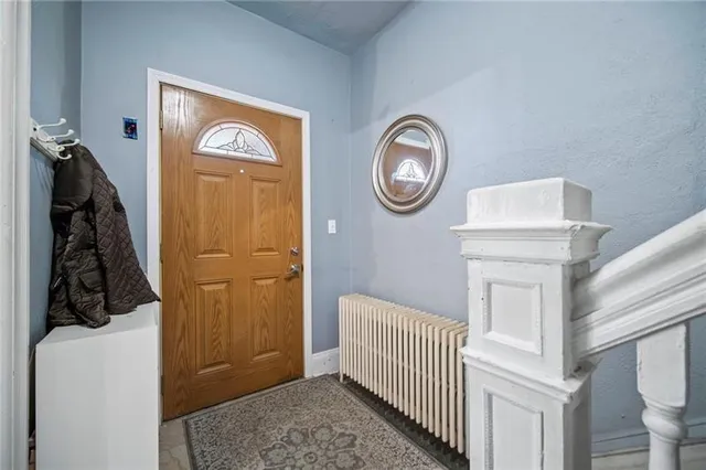 a view of a hallway with entryway