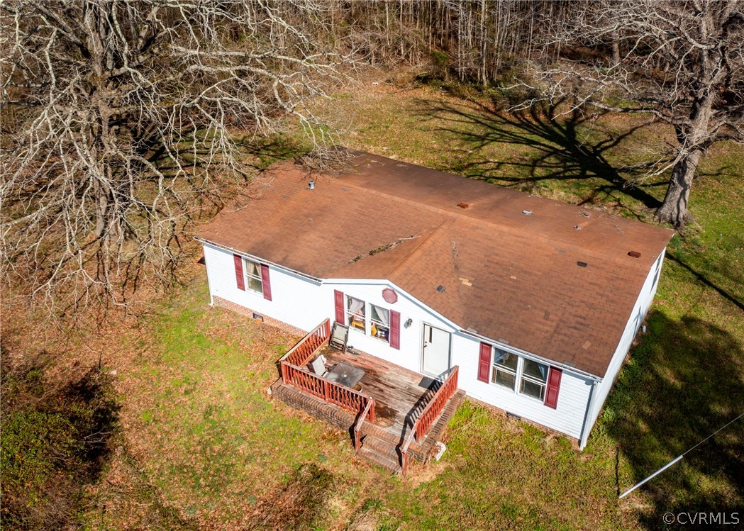 14306 Wilkinson Road Dewitt, VA 23840 - Photo 1 of 23 an aerial view of a house with a yard