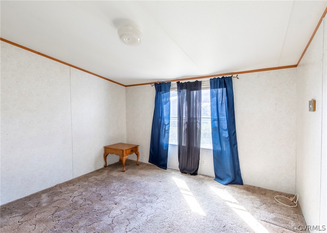 14306 Wilkinson Road Dewitt, VA 23840 - Photo 17 of 23 a view of a room with closet and wooden floor