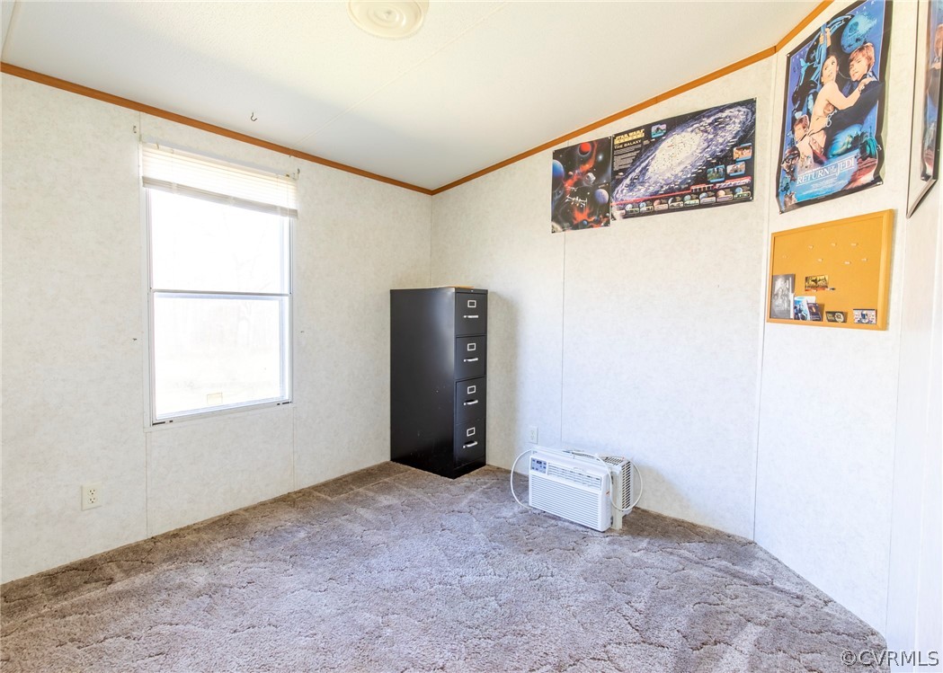 14306 Wilkinson Road Dewitt, VA 23840 - Photo 21 of 23 a view of an empty room with a window