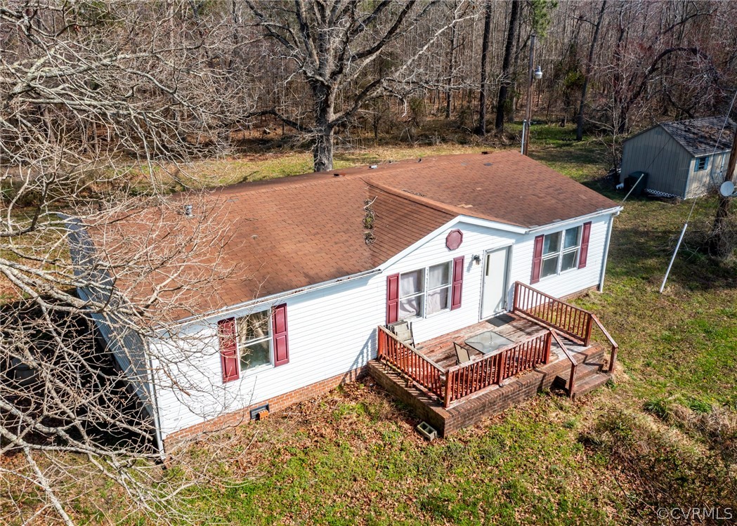 14306 Wilkinson Road Dewitt, VA 23840 - Photo 4 of 23 a aerial view of a house with roof yard