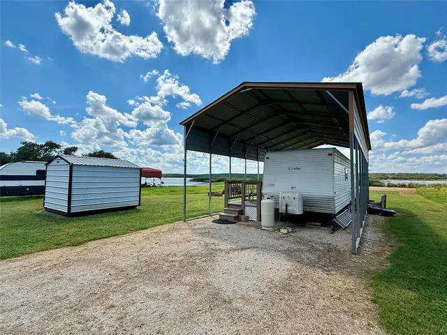 a view of a balcony with chairs