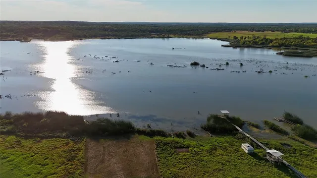 a view of a backyard of the house