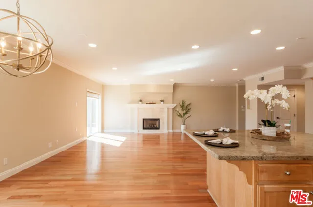 a kitchen with sink and cabinets