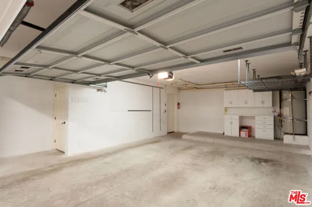 a view of empty room with fireplace