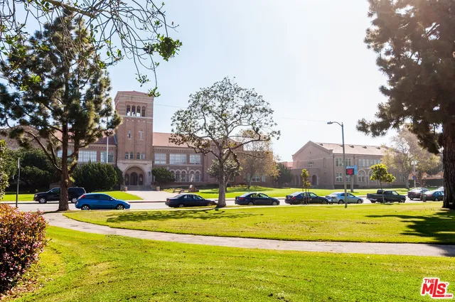 a building with trees in front of it