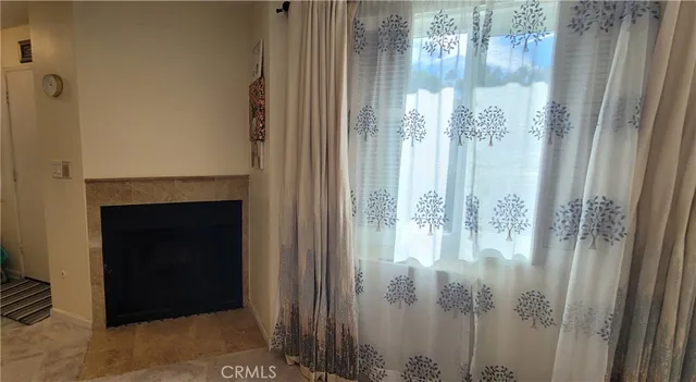 a dining room with furniture and entryway