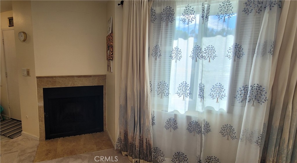 19221 Sherman Way, Unit 6 Reseda, CA 91335 - Photo 11 of 35 Fireplace in the living room