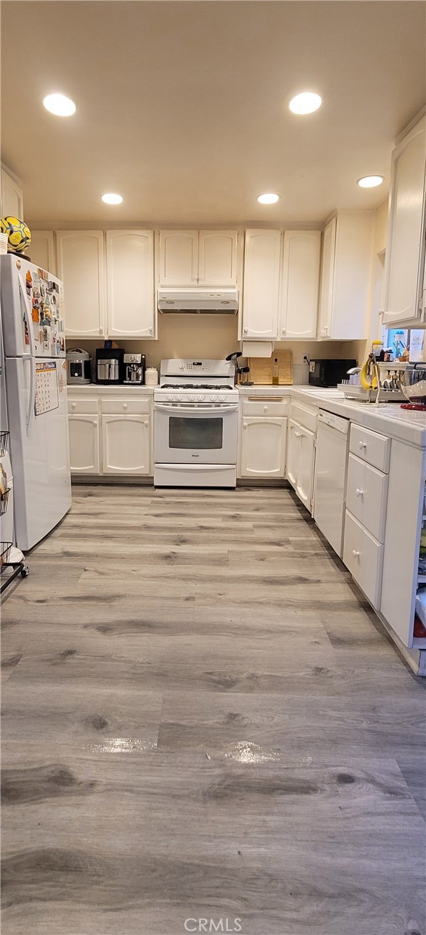 19221 Sherman Way, Unit 6 Reseda, CA 91335 - Photo 12 of 35 Kitchen view