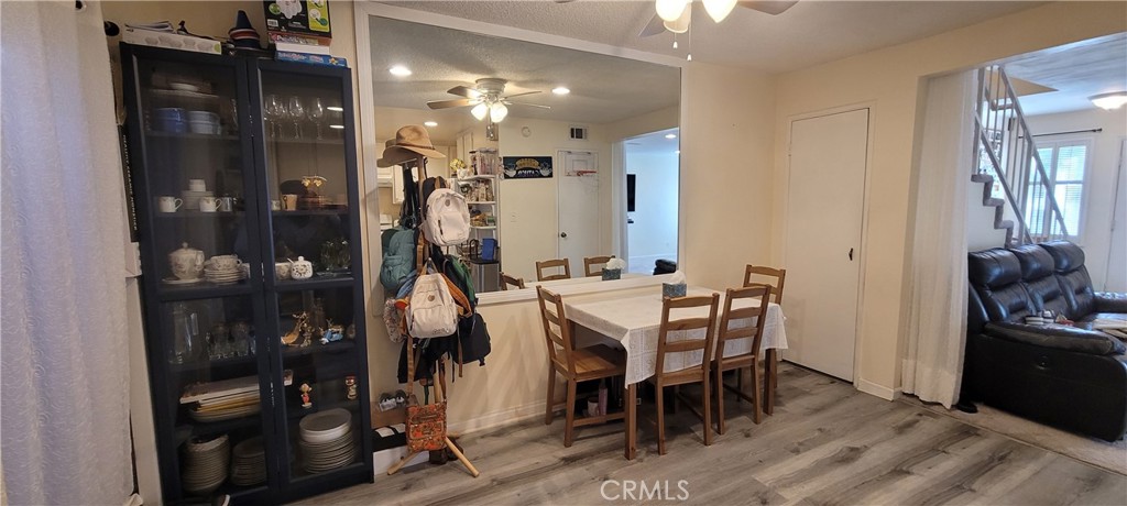 19221 Sherman Way, Unit 6 Reseda, CA 91335 - Photo 14 of 35 a dining room with furniture and entryway