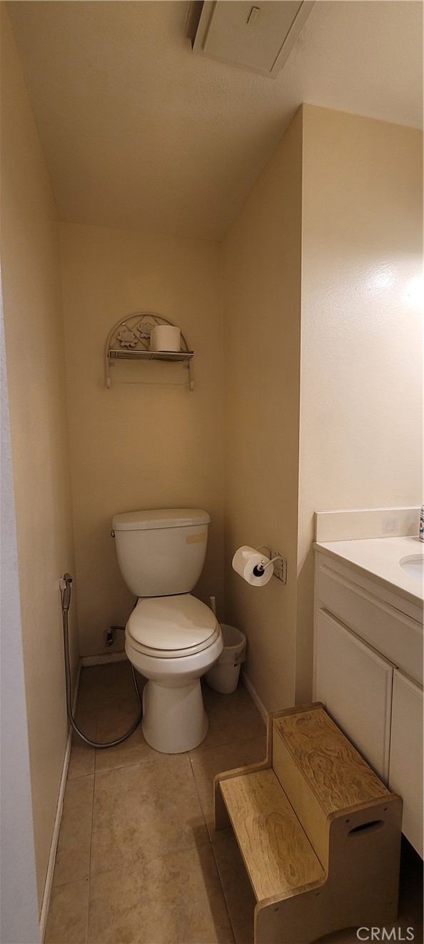 19221 Sherman Way, Unit 6 Reseda, CA 91335 - Photo 16 of 35 a bathroom with a toilet and a sink