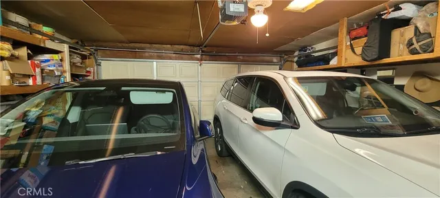 a living room with a couch and a window