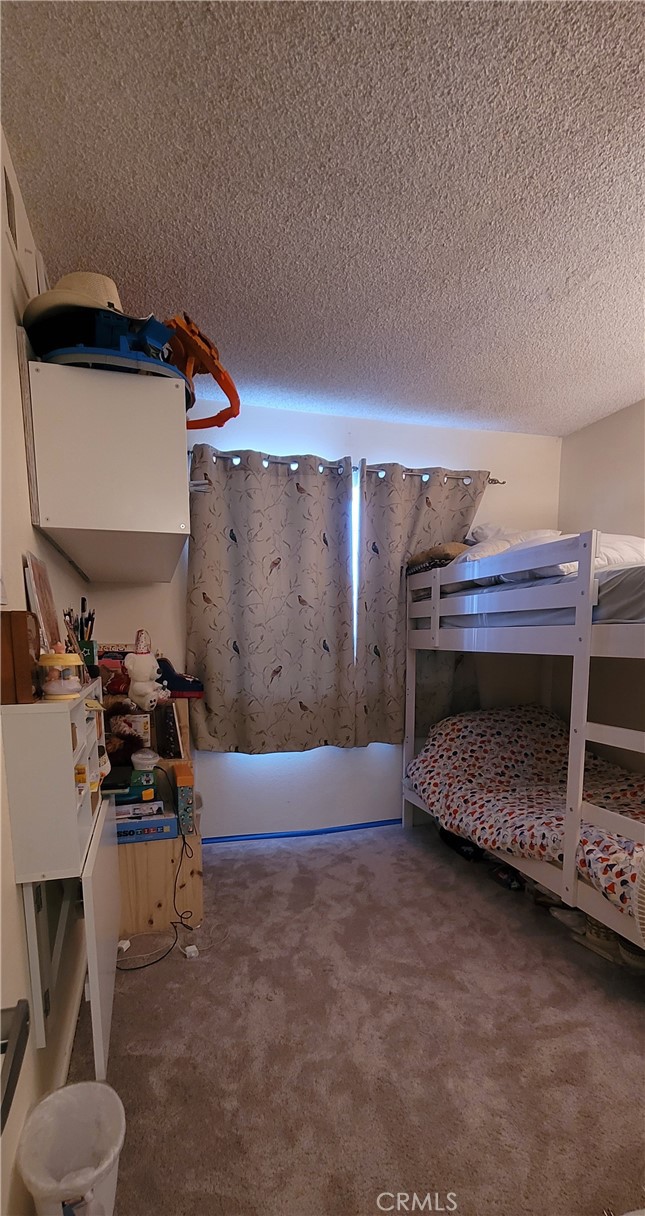 19221 Sherman Way, Unit 6 Reseda, CA 91335 - Photo 29 of 35 a room with furniture and a fireplace