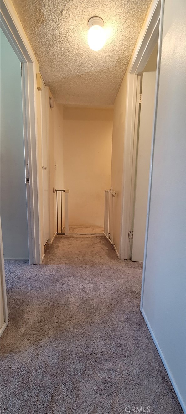 19221 Sherman Way, Unit 6 Reseda, CA 91335 - Photo 33 of 35 a view of room with walk in closet and wooden floor