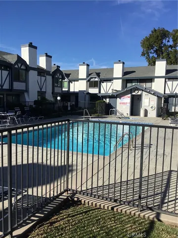a room with furniture and a flat screen tv