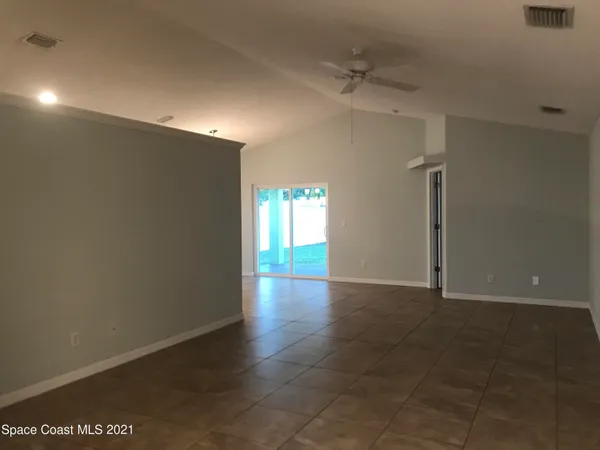 a view of hallway with a window