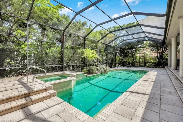 a view of yard with swimming pool