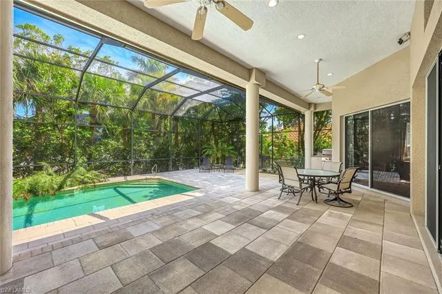 an aerial view of residential building with parking space