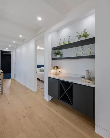 a bathroom with a shower and a sink