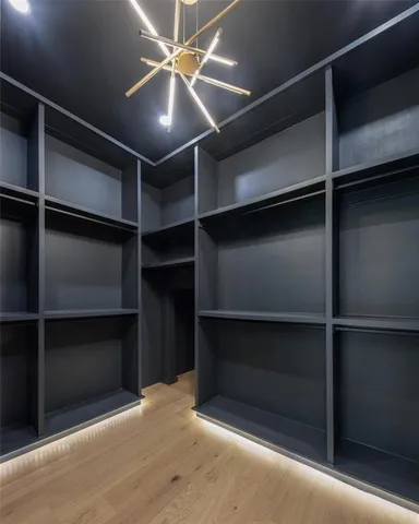 a bathroom with a tub a sink and shower
