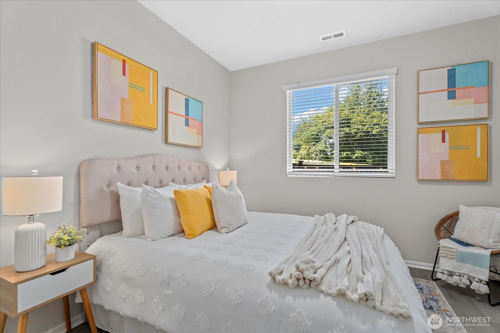 9901 13th Street Southeast Lake Stevens, WA 98258 - Photo 15 of 37 a bedroom with a bed and wooden floor