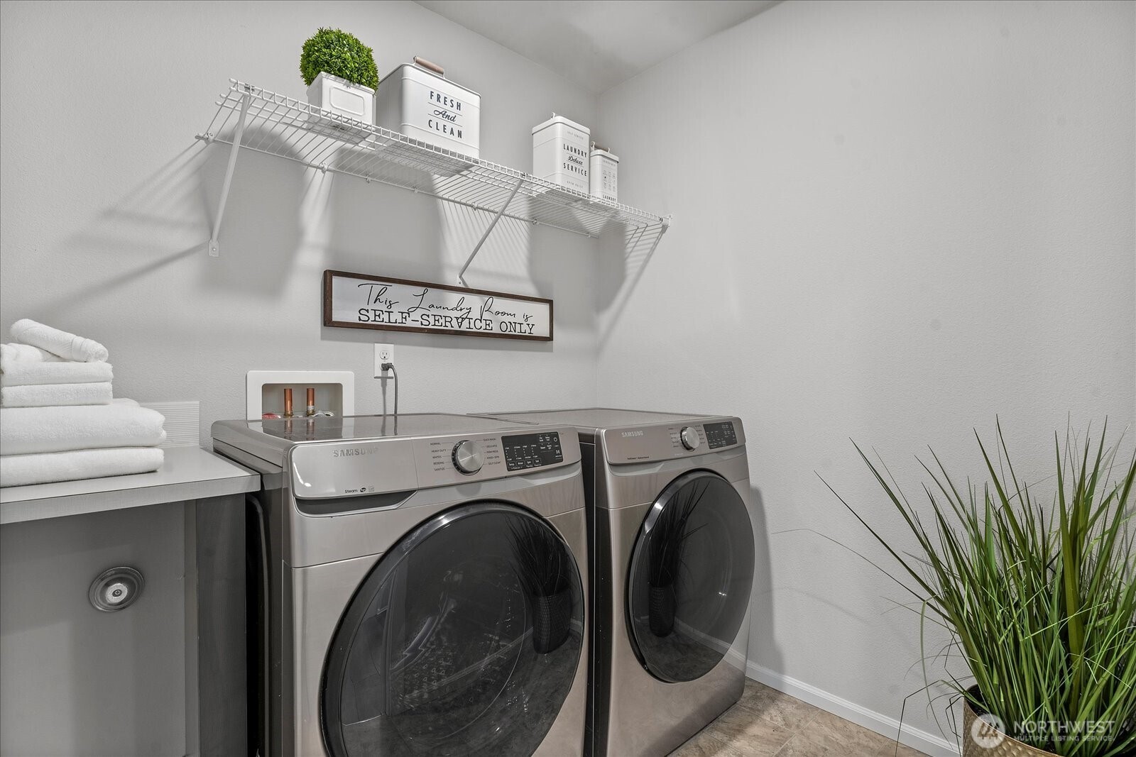 9901 13th Street Southeast Lake Stevens, WA 98258 - Photo 29 of 37 a view of livingroom with washer and dryer