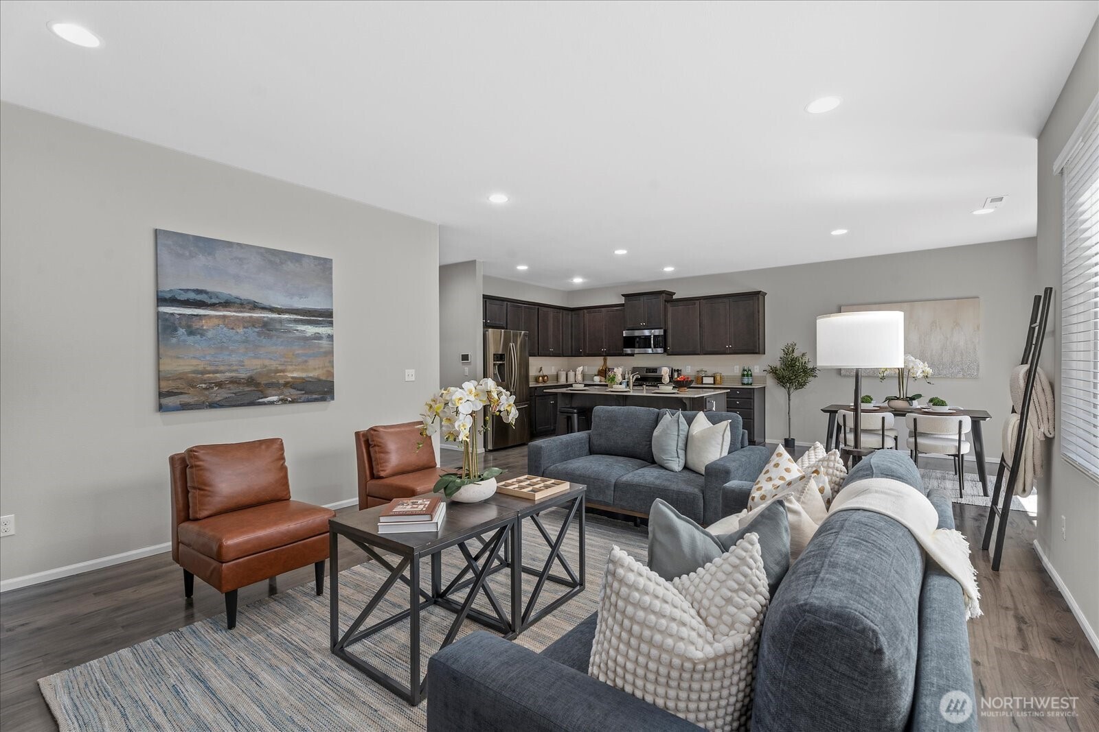 9901 13th Street Southeast Lake Stevens, WA 98258 - Photo 5 of 37 a living room with furniture and a wooden floor