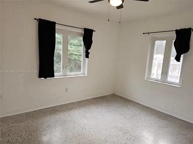 a view of a window in an empty room
