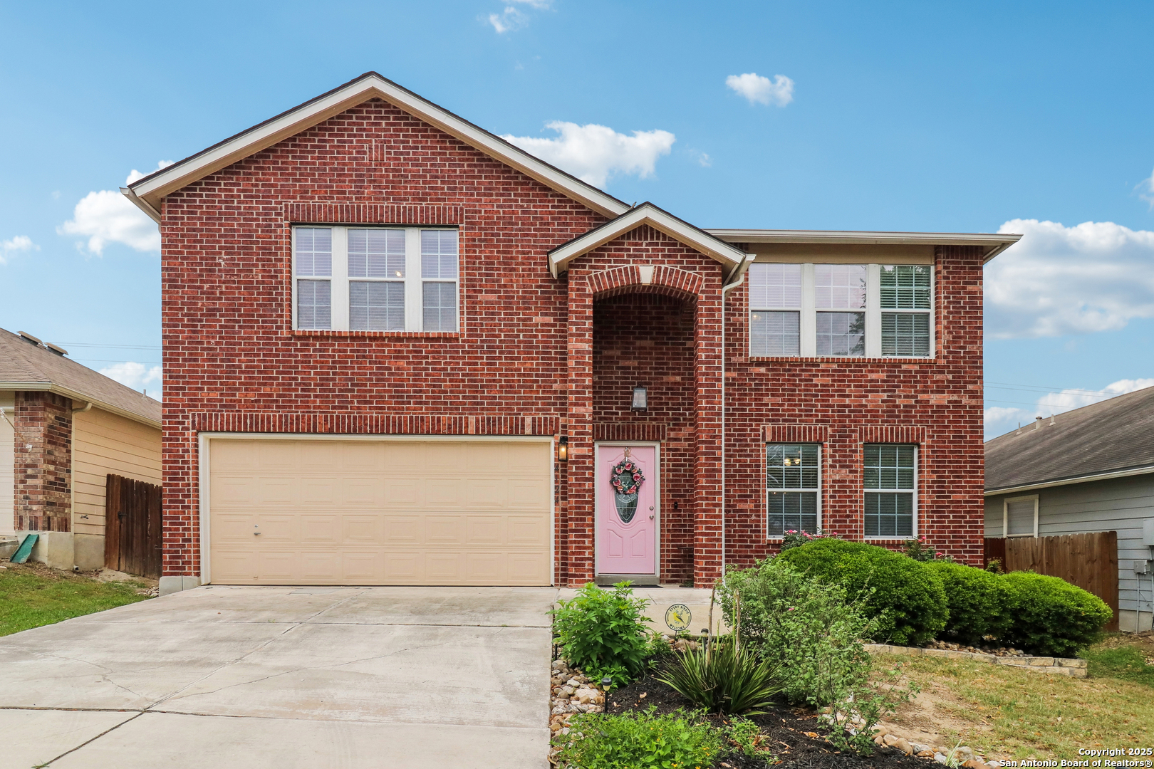 4124 Whisper Point Schertz, TX 78108 - Photo 1 of 36 a front view of a house with a yard and garage